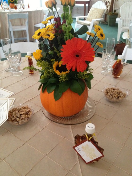 The bridesmaids and family had made the table toppers.